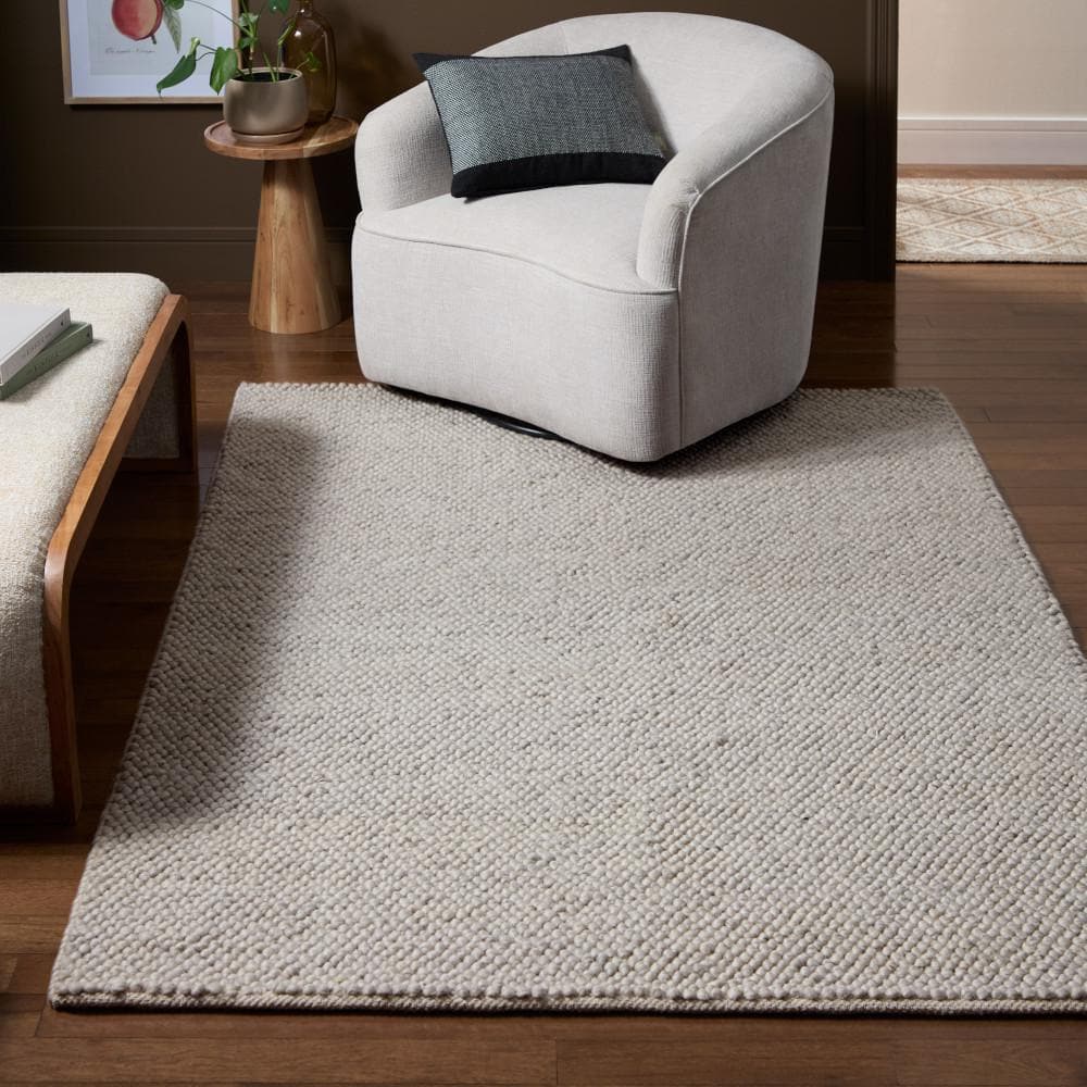 Handcrafted Beige Wool Rectangular Area Rug 5' x 7'