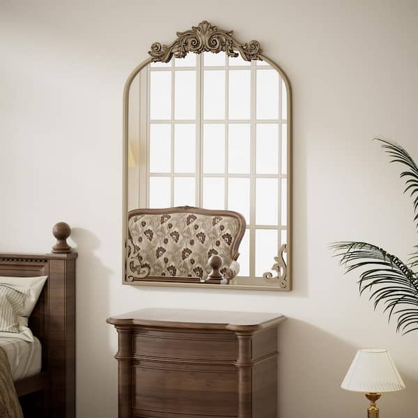 24 in. W x 38.6 in. H Arched Bronze Metal Framed with Carved Decoration Vanity Mirror Wall Mirror