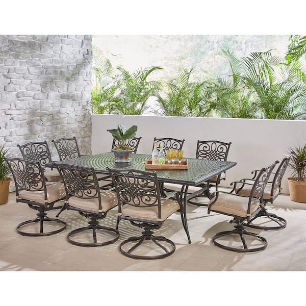 Hanover Traditions 11-Piece Aluminum Outdoor Dining Set with 10 Swivel Rockers and Tan Cushions, Rectangular Dining Table