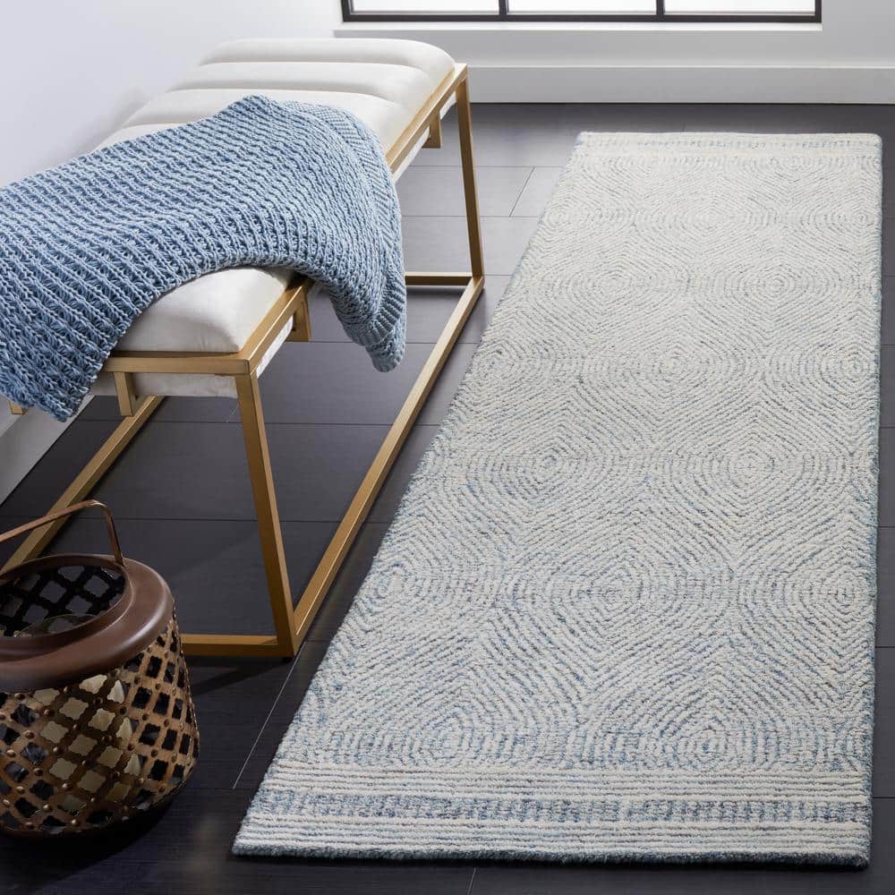 Ivory and Blue Abstract Hand Tufted Wool Area Rug