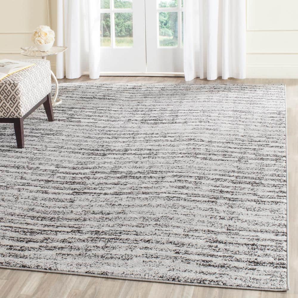 Reversible Black Stripe Synthetic 8' x 10' Rectangular Rug