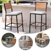 Two bar stools in a kitchen or patio setting.