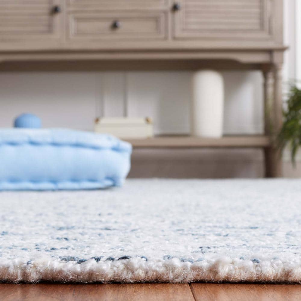 Ebony Light Blue Wool and Synthetic Hand Tufted Area Rug