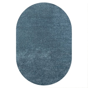 Haze Solid Low-Pile Turquoise 3 ft. x 5 ft. Oval Area Rug