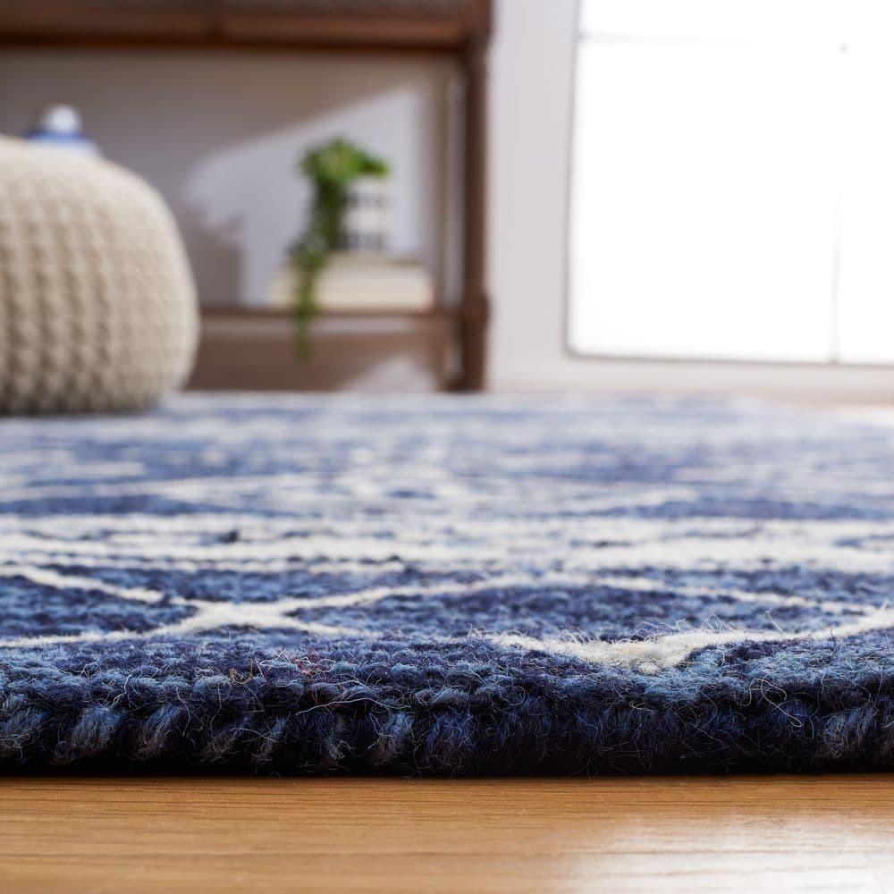 Ivory Rectangular Handmade Tufted Wool 8' x 10' Rug