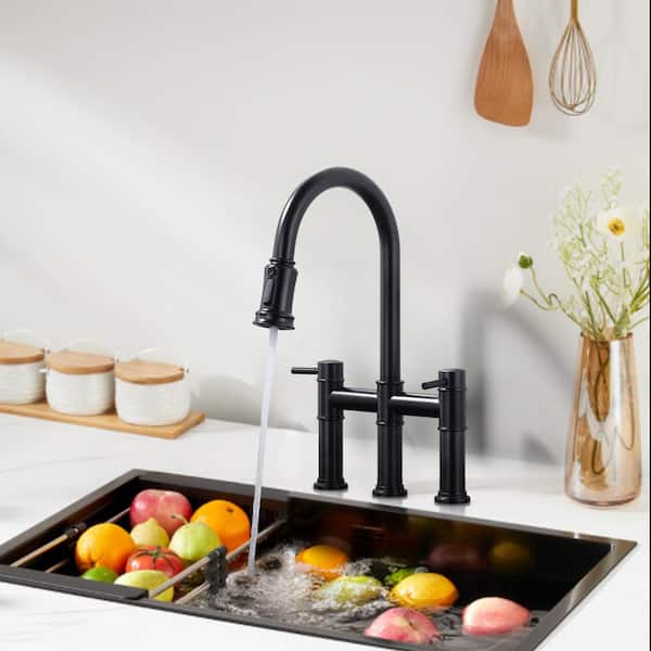 Double Handle Pull-Down Bridge Kitchen Faucet with Brass and Stainless Steel in Oil Rubbed Bronze
