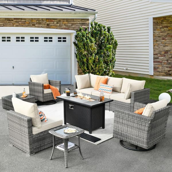 XIZZI Harlotte 9-Piece Wicker Patio Rectangular Fire Pit Set with Beige Cushions and Swivel Rocking Chairs