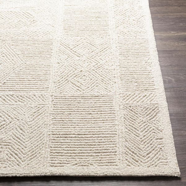 Newcastle Cream Solid 6 ft. x 9 ft. Indoor Area Rug