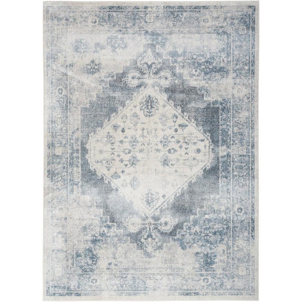 Nourison Astra Machine Washable Blue Ivory 5 ft. x 7 ft. Distressed Traditional Area Rug