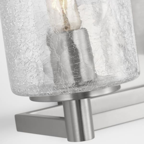 Generation Lighting - Parker 14.25 in. W x 7.75 in. H 2-Light Brushed Steel Bathroom Vanity Light with Clear Crackle Glass Shades