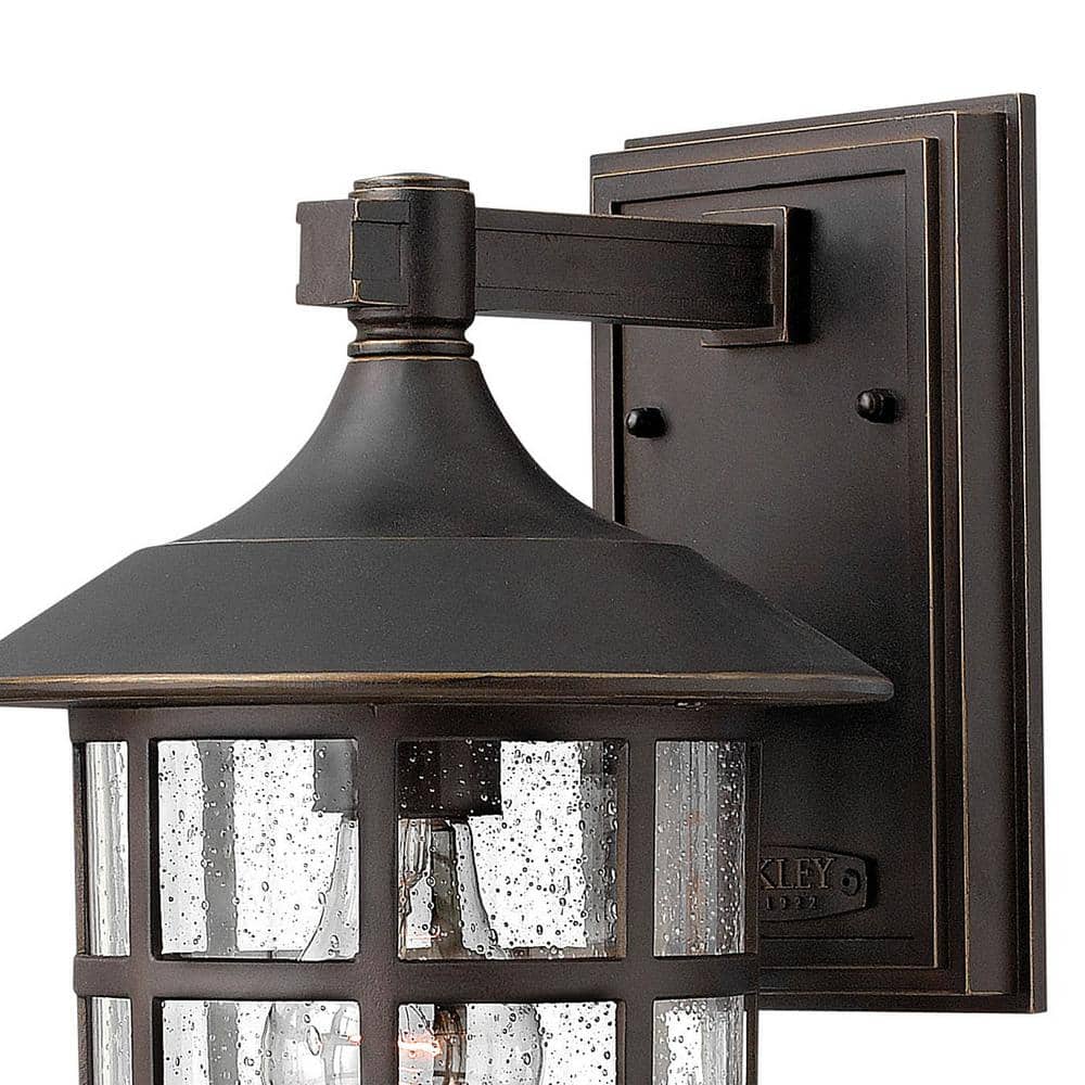 Freeport Classic Bronze Outdoor Wall Sconce with Clear Seedy Glass