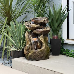 22 in. Tall Outdoor Four-Tier Rainforest Log Waterfall Fountain with LED Lights