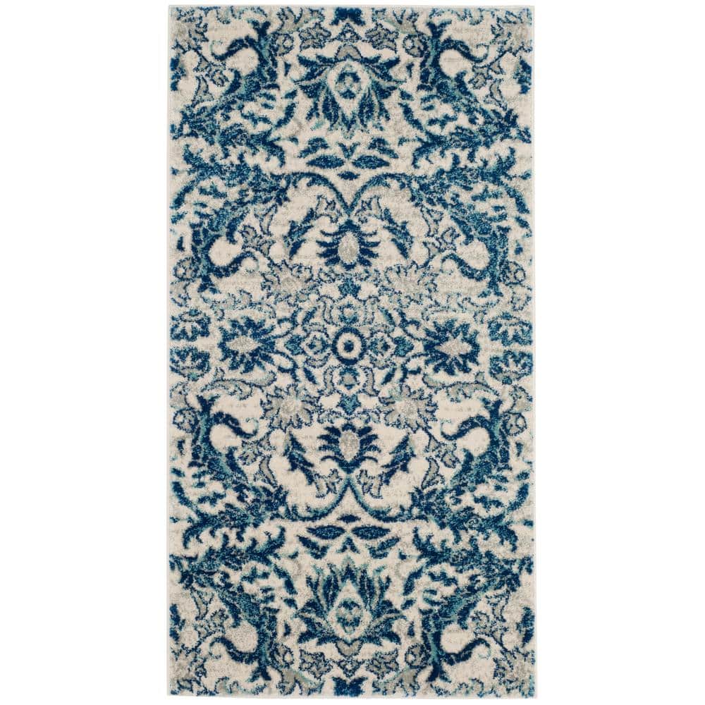 Ivory and Blue High Pile Synthetic Reversible Area Rug