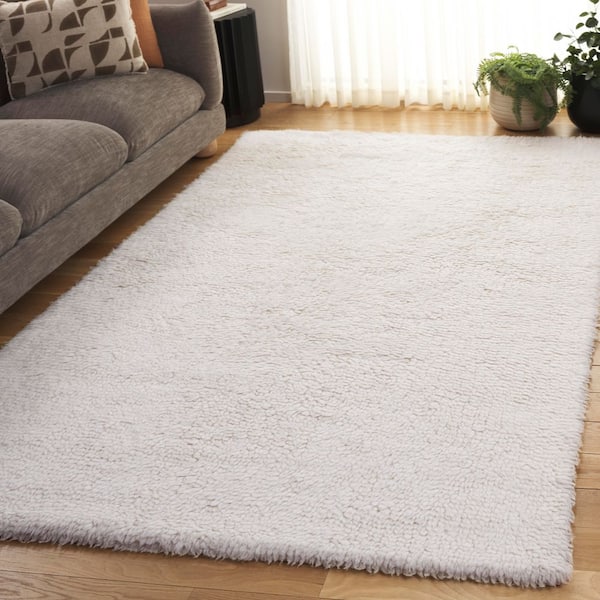 Casablanca 9 ft. x 12 ft. Ivory Solid Area Rug