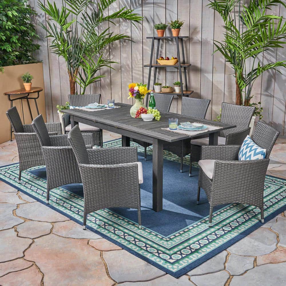 Noble House Nadia Grey 9-Piece Wood and Faux Rattan Outdoor Dining Set with Silver Cushions -  53093