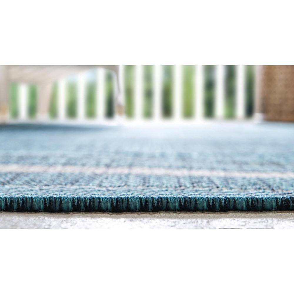 5' x 8' Teal Blue and Beige Flat Woven Outdoor Area Rug