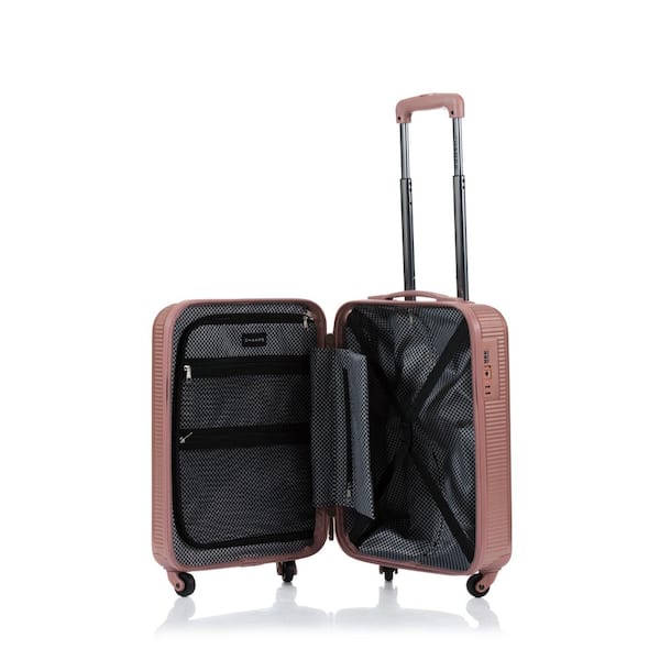 champs rose gold luggage