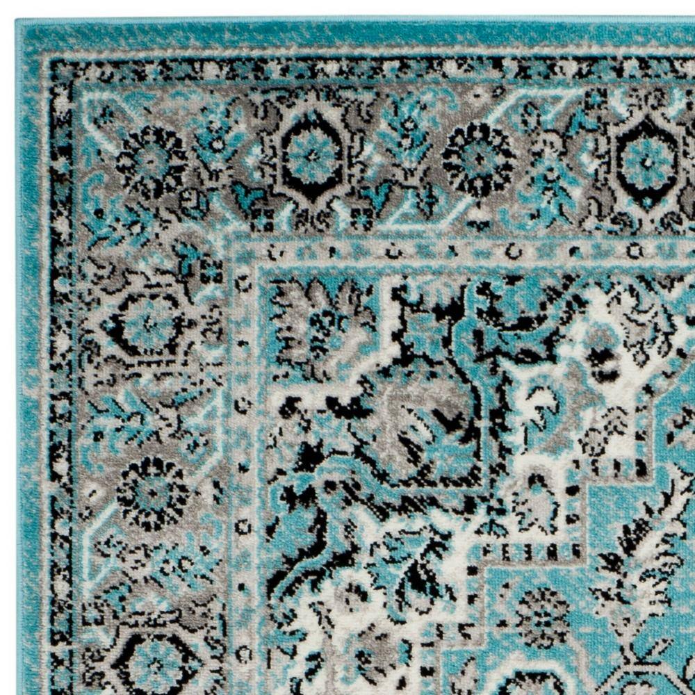 Ivory & Blue Floral Reversible Synthetic Area Rug 6' x 9'