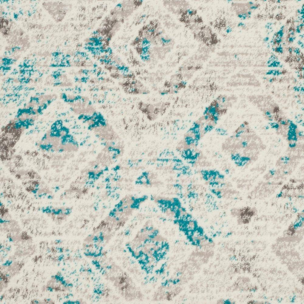 Ivory and Blue Medallion 6' x 9' Synthetic Area Rug
