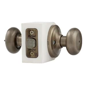 Juno Antique Brass Privacy Bed/Bath Door Knob with Microban Antimicrobial Technology and Lock