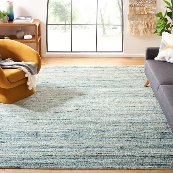 Casablanca 8 ft. x 10 ft. Turquoise/Ivory Solid Color Area Rug
