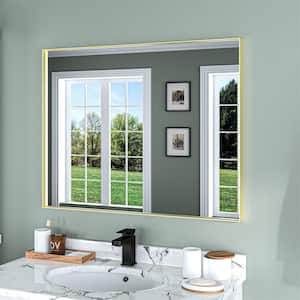 28 in. W x 36 in. H Gold Aluminum Rectangle Framed Tempered Glass Wall-mounted Bathroom Mirror