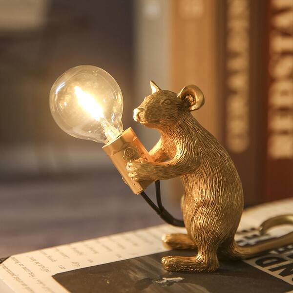 mouse holding light bulb