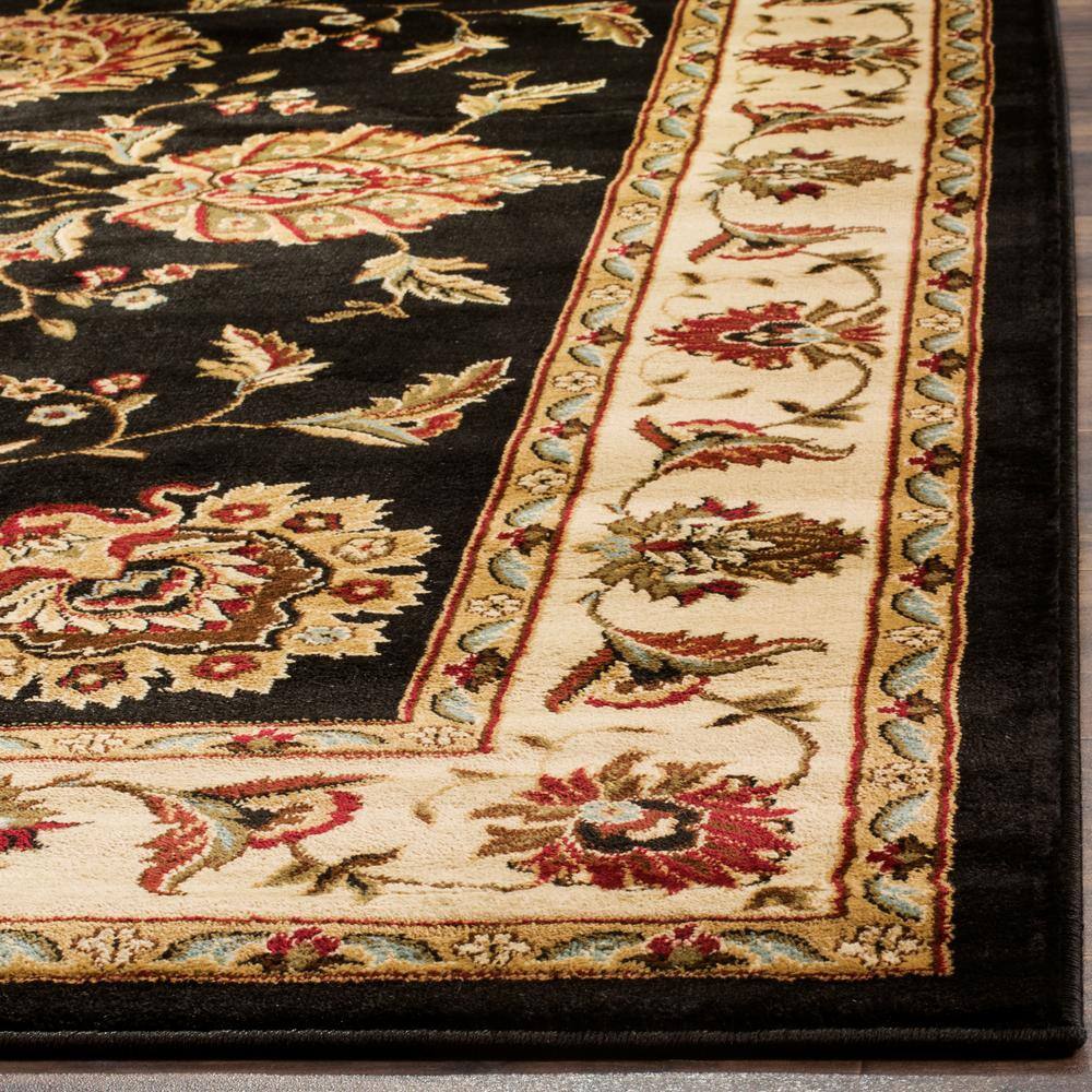Black and Ivory Floral Synthetic 5' x 7' Area Rug