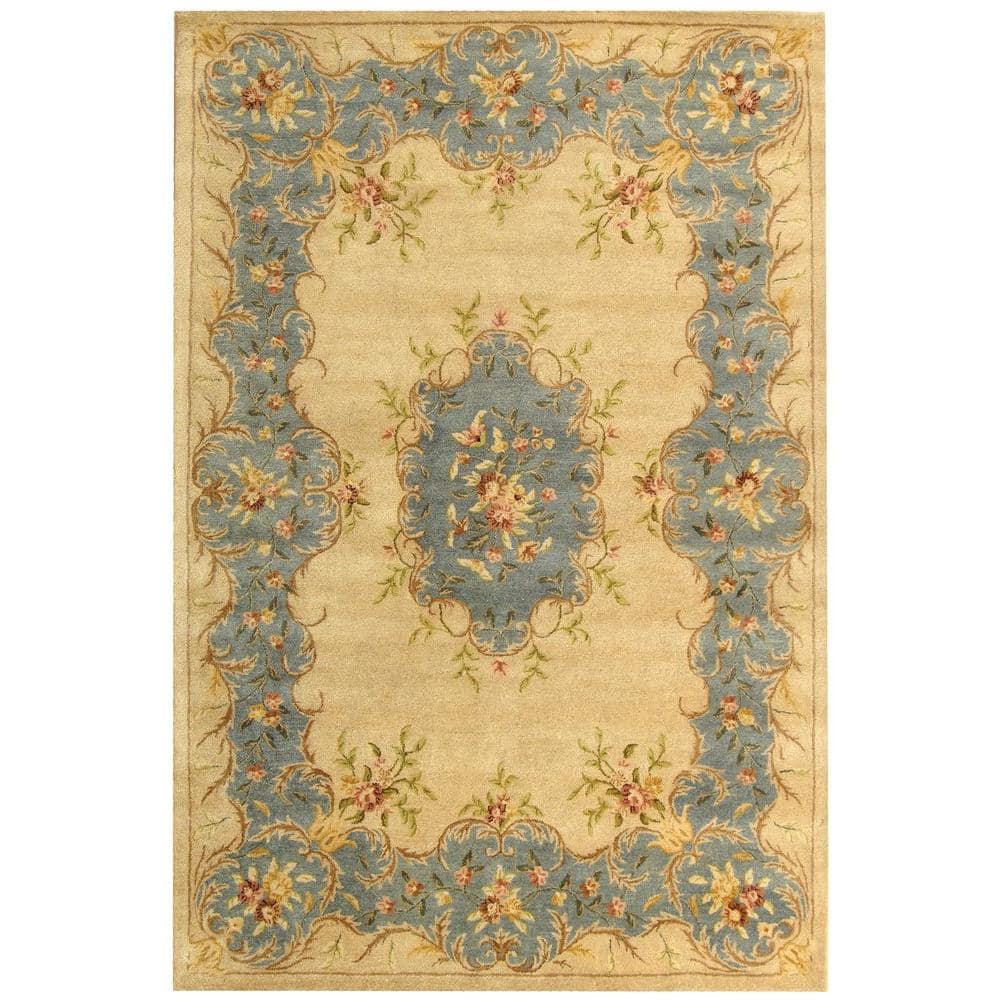 Ivory and Light Blue 6' x 9' Hand-Tufted Wool Area Rug