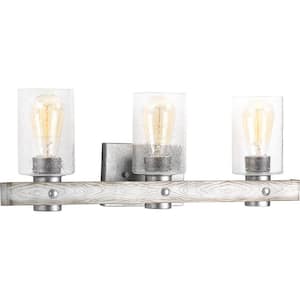 Gulliver Collection 24 in. 3-Light Galvanized Finish Clear Seeded Glass Coastal Bathroom Vanity Light