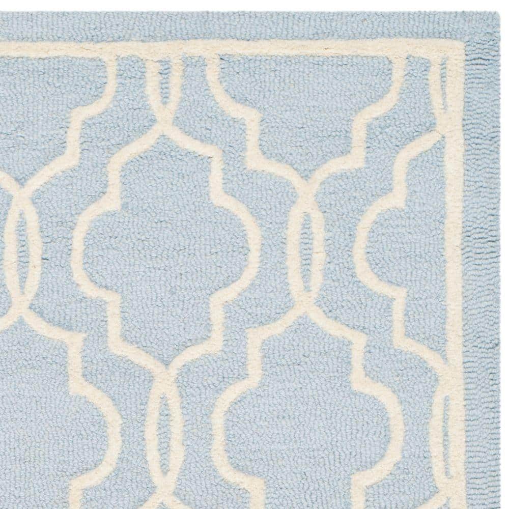 Ivory and Light Blue Hand-Tufted Wool Area Rug