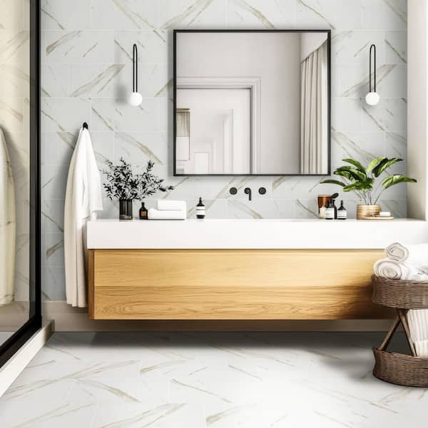 Pietra Calacatta 12 in. x 24 in. Matte Porcelain Marble Look Floor and Wall Tile (16 sq. ft./Case) Pietra Calacatta 12 in. x 24 in. Matte Porcelain Marble Look Floor and Wall Tile (16 sq. ft./Case)
