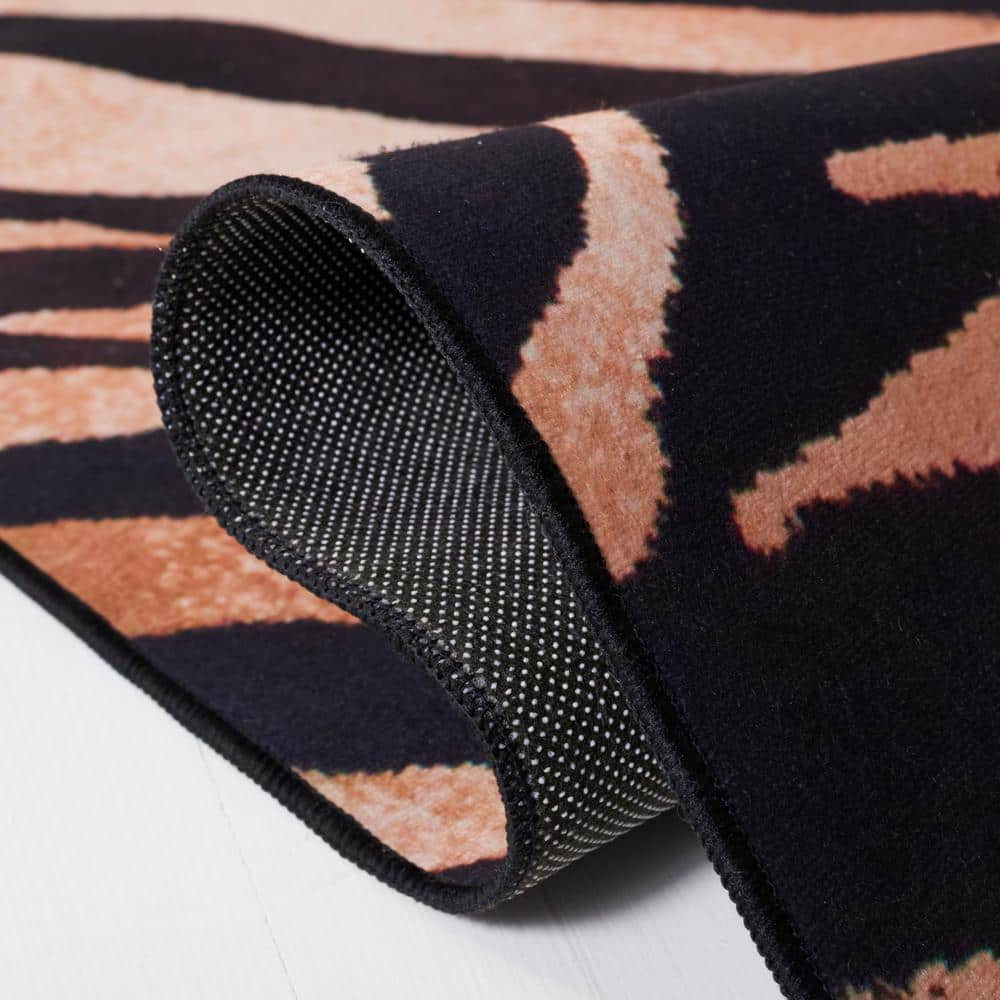 Black and Light Orange Faux Fur 6' x 9' Washable Rug
