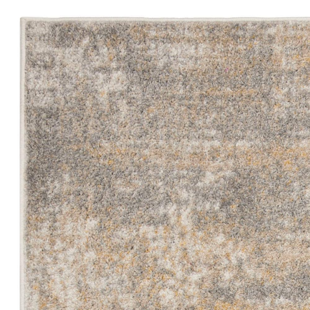 Creme and Gold Abstract Synthetic Area Rug 4' x 6'