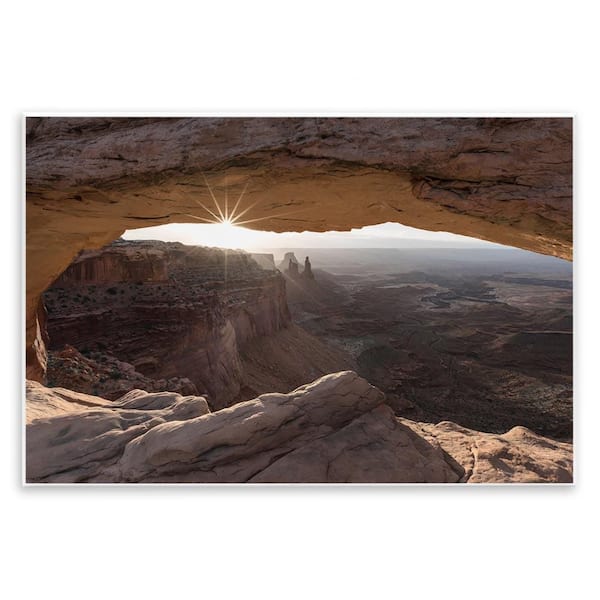 Stupell Industries Peeking Through Desert Arch by Danita Delimont Unframed Nature Graphic Art Print 13 in. x 19 in.