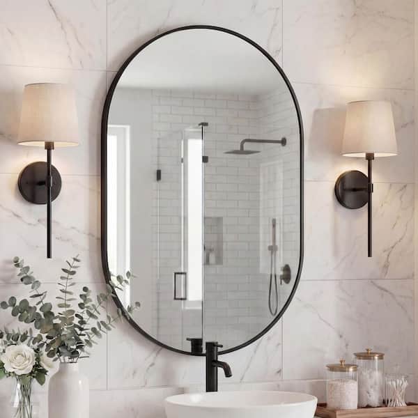 Milly 24 in. W x 36 in. H Medium Oval Metal Framed Wall Mirror, Black