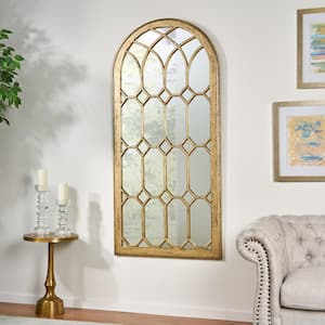 Dipietro 64 in. x 30 in. Classic Arch Framed Distressed Gold Accent Mirror