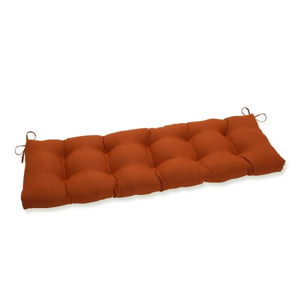 Pillow Perfect Solid Rectangular Outdoor Bench Cushion in Orange