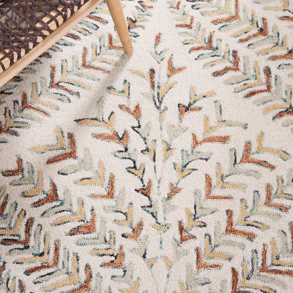 Hand-Tufted Ivory and Blue Wool 6' x 9' Area Rug