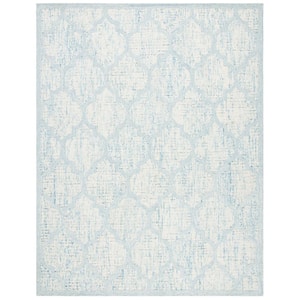 Abstract Ivory/Turquoise 9 ft. x 12 ft. Distressed Quatrefoil Area Rug