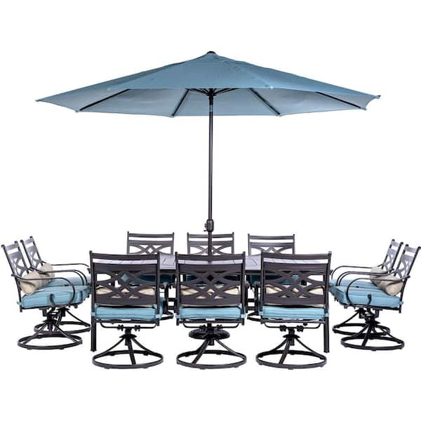 Hanover Montclair 11-Piece Steel Outdoor Dining Set with Ocean Blue Cushions, 10 Swivel Rockers, 60x84 in. Table and Umbrella