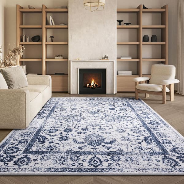 Adirondack 9 ft. x 12 ft. Ivory/Navy Border Distressed Area Rug