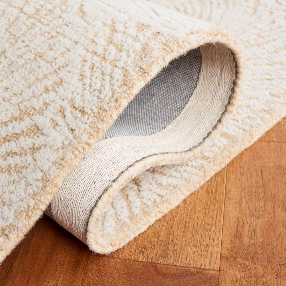 Gold and Ivory Tufted Wool 3' x 5' Area Rug