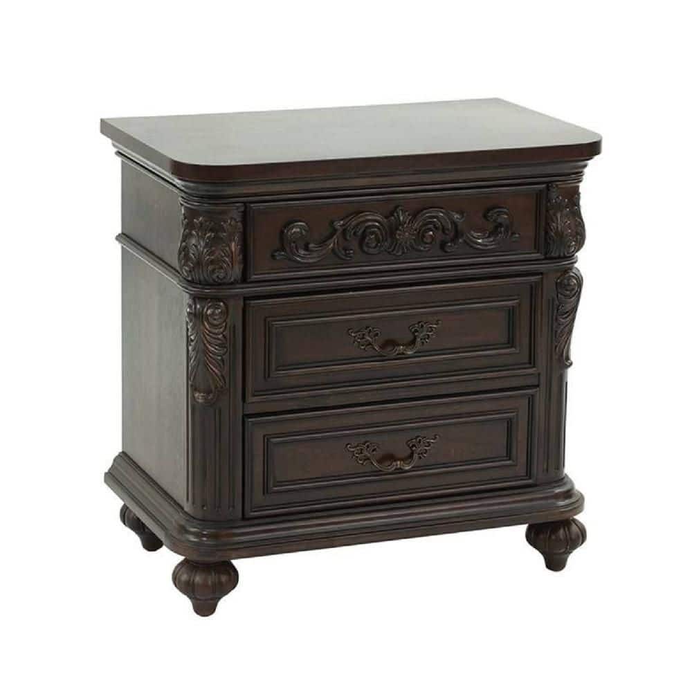 Dark brown wood nightstand with three drawers and ornate carvings.