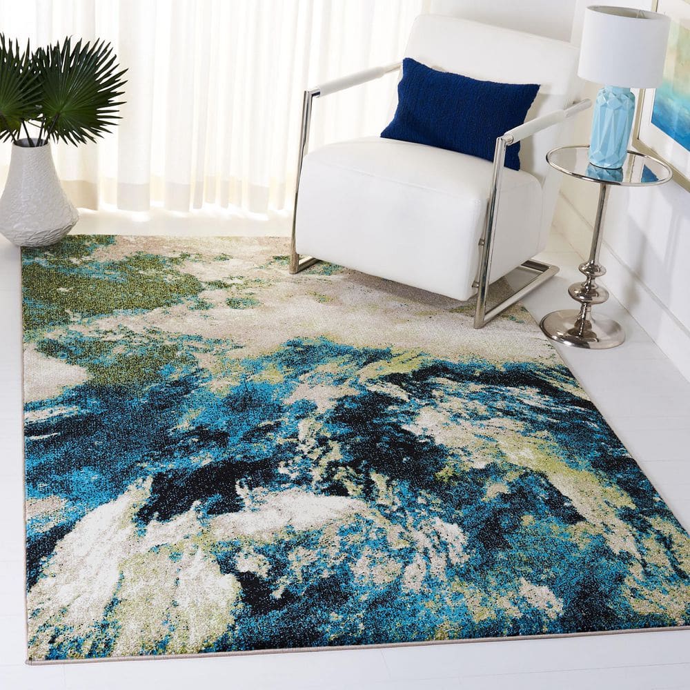 Navy and Green Abstract 4' x 6' Synthetic Area Rug