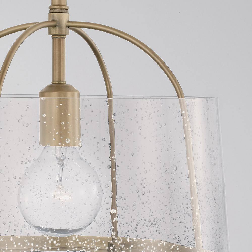 Aged Brass and Clear Seeded Glass Drum Pendant Light
