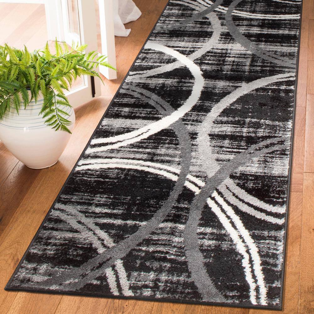 Black and Gray Abstract Synthetic 5' x 7' Area Rug