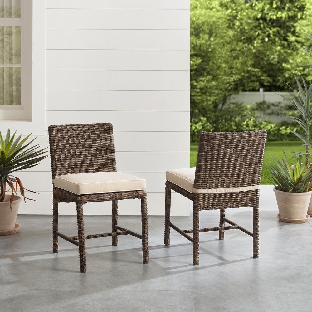 Bradenton Weathered Brown Wicker Outdoor Dining Chairs with Sand Cushions