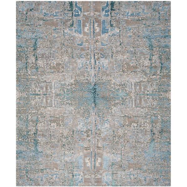 Centennial 9 ft. x 12 ft. Worn Denim Distressed High-Low Area Rug