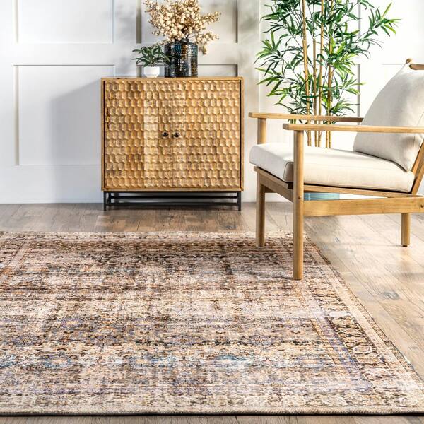 nuLOOM Livy Handmade Jute and Leather Tribal Fringe Natural 8 ft. x 10 ft. Area Rug